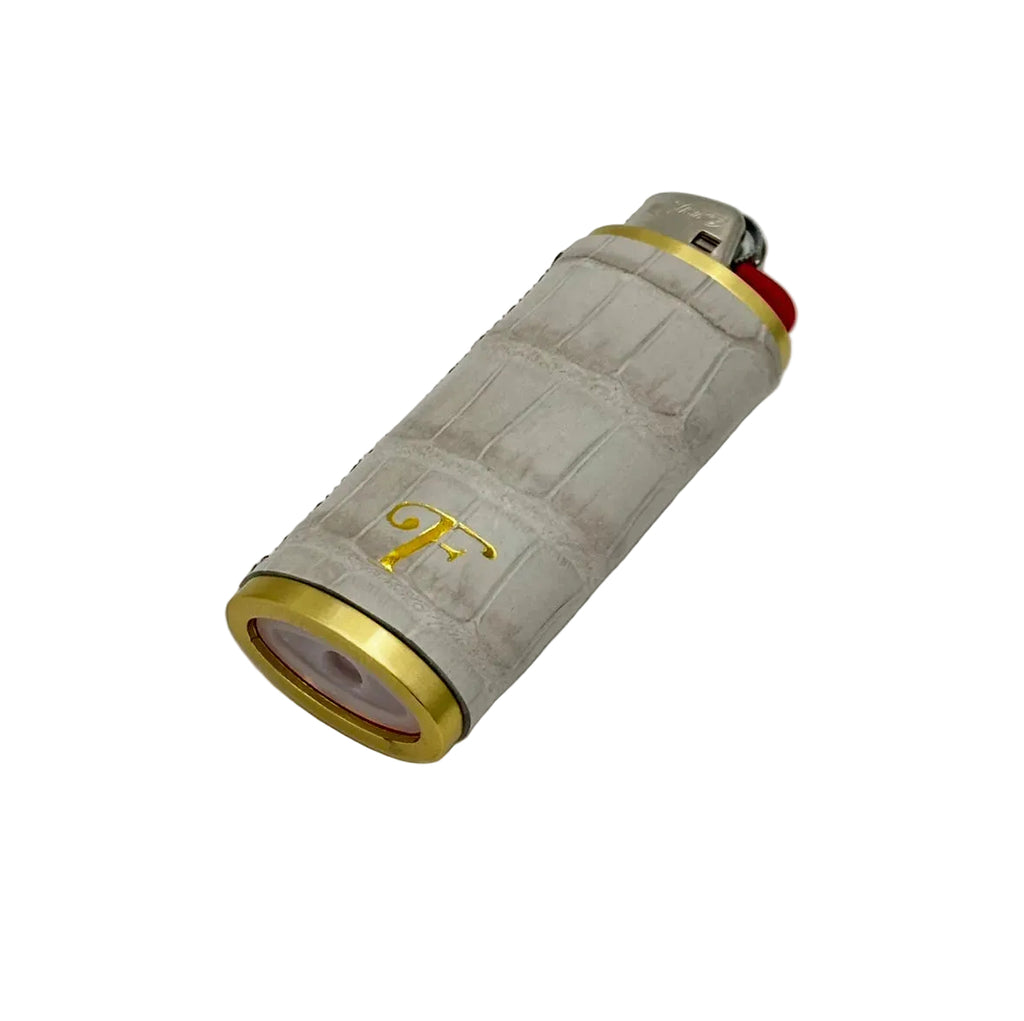Himalayan alligator leather lighter sleeve with gold hardware rings and Frostytch monogram stamp, side view