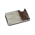 Himalayan alligator and carbon fiber minimalist card holder showing the two-tone alligator leather face