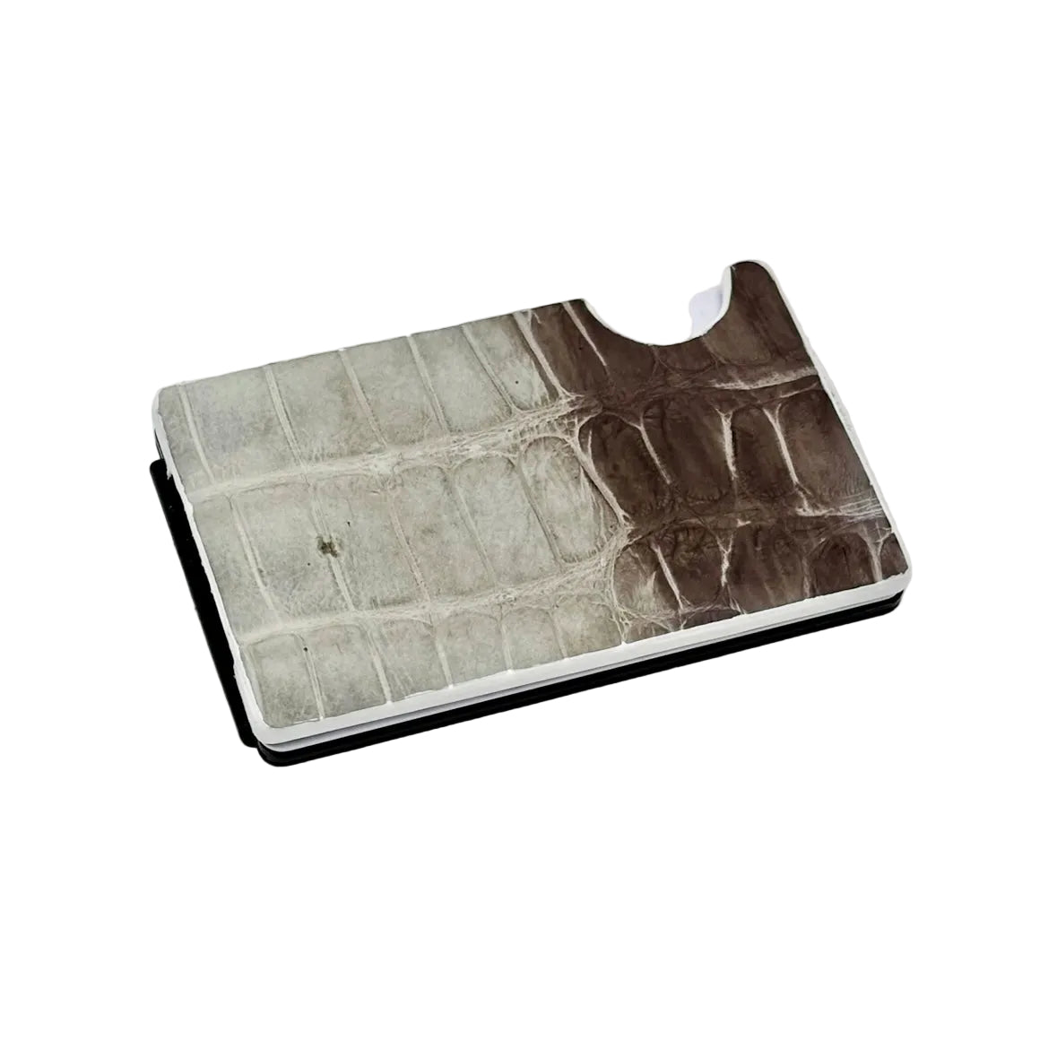 Himalayan alligator and carbon fiber minimalist card holder showing the two-tone alligator leather face