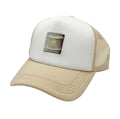 Two-tone Himalayan alligator trucker hat with white front crown, tan mesh back, and gold monogram alligator patch