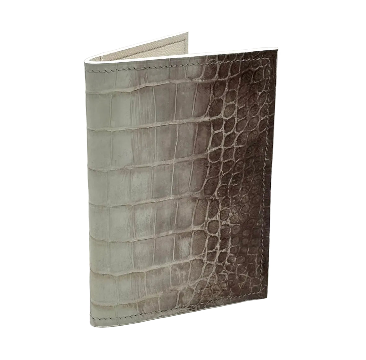 Himalayan alligator passport cover standing open showing natural ivory-to-brown gradient on exterior