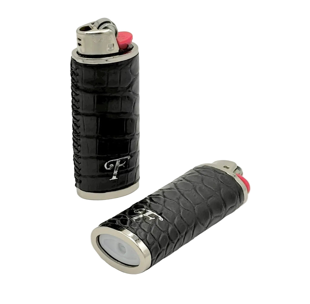 Matte black crocodile lighter sleeves with silver hardware and Frostytch monogram