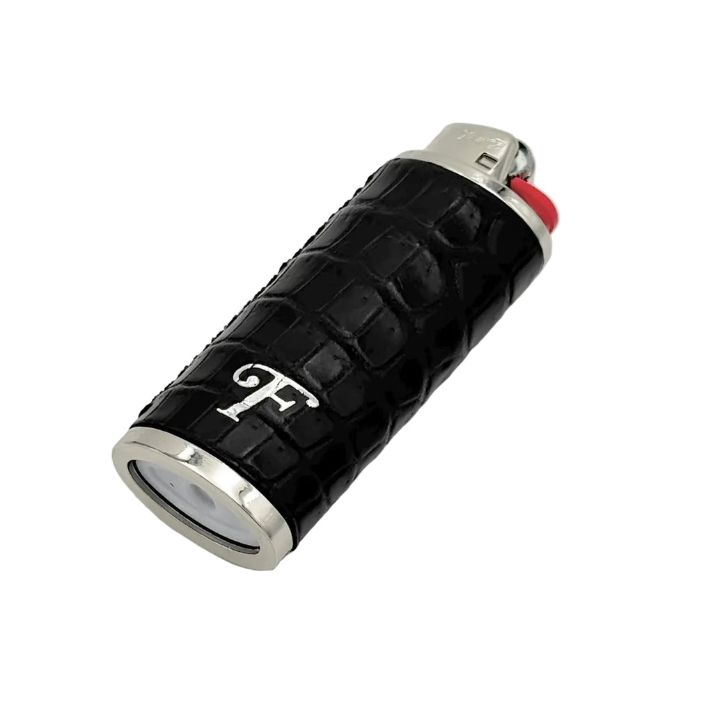Matte black crocodile lighter sleeve close-up with silver ring detail