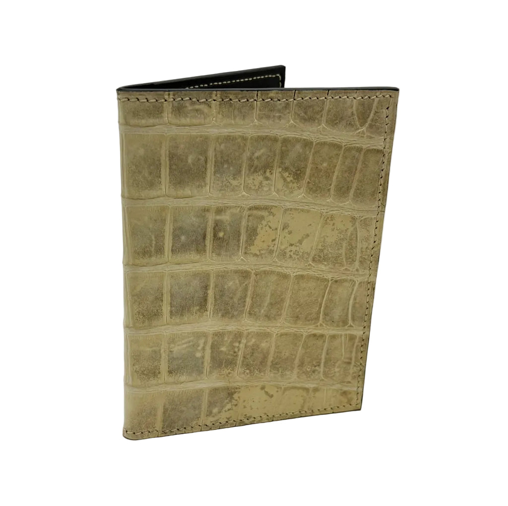 Glazed natural alligator passport cover — exterior view showing luminous olive-tone scales and hand-stitched edges