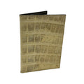 Glazed natural alligator passport cover — exterior view showing luminous olive-tone scales and hand-stitched edges